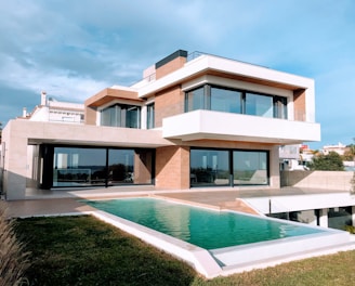 white and brown concrete building under blue sky during daytime